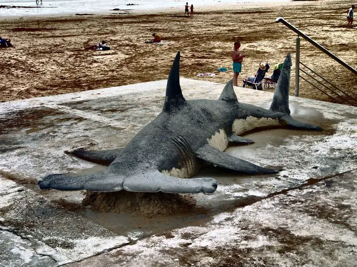 Artist creates detailed sand sculptures