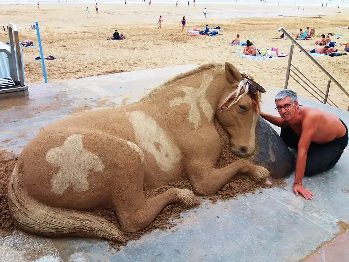 Artist creates detailed sand sculptures